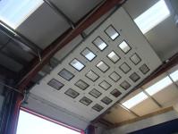 Porte sectionnelle automatique à double enveloppe avec sectionnelle isolée