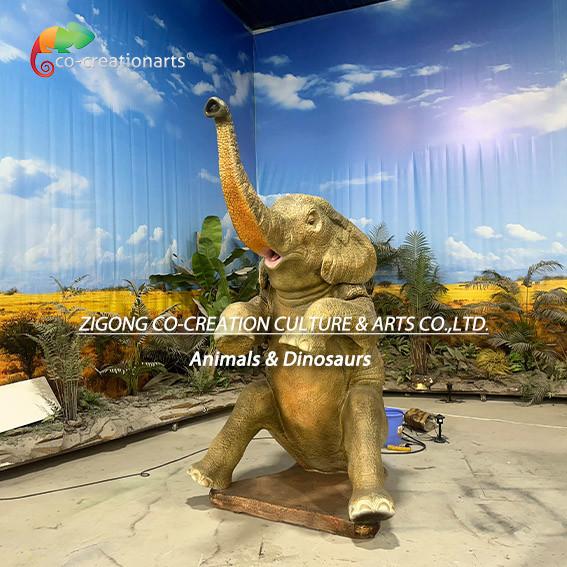 Realistic Animatronic African Elephant Statue Spraying Water In Safari Setting