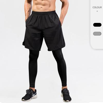 O Activewear seco rápido dos homens da dupla camada assenta-se com as calças justas respiráveis internas