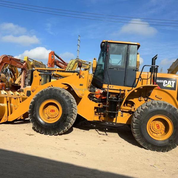 Chargeuse sur pneus CAT 966H d'occasion 23t pour la construction et l'exploitation minière