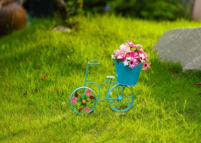 A bicicleta personalizada do metal dá forma ao múltiplo da decoração da casa do potenciômetro do jardim