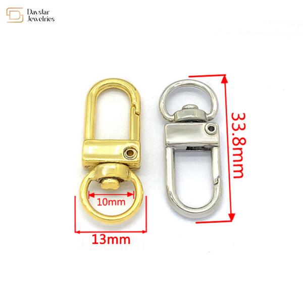 Части сумки поворачивают на шарнирах щелчковые пряжки сплава цинка крюка для делать ювелирных изделий DIy ключевых колец