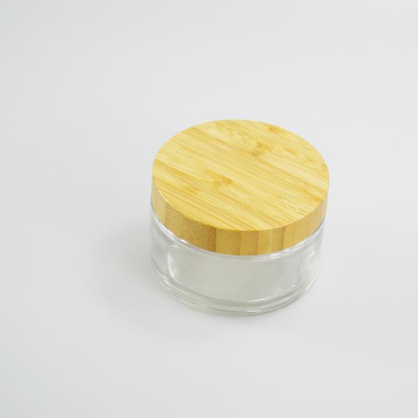 200g Jar de vidrio de crema con tapa de bambú para el cuerpo del producto mantequilla en cualquier color que desee