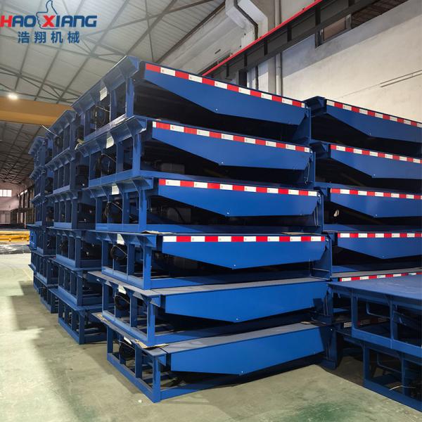 Blue Hydraulic Unloading Ramp for Efficient 220V Forklift Operations