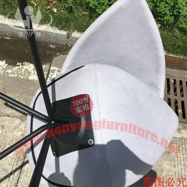 Boconcept Ottowa chair by Karim Rashid with assemble stainless steel leg ottoma chair in aniline leather finish