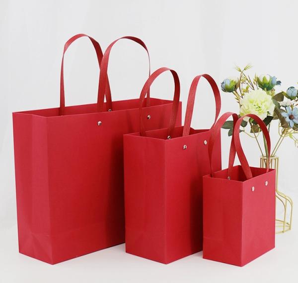 Luxury Red Rivet Handle Paper Bags Custom Logo Boutique Shopping Bags For Fashion Gifts