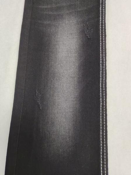 75% de algodón 8.3 oz de peso medio Twill estilo negro / negro estiramiento de denim tela 12S para mujer jeans