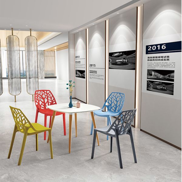 Yellow Modern Plastic Chair Durable Lightweight Ergonomic Design For Office Dining Outdoor Seating And Commercial Spaces