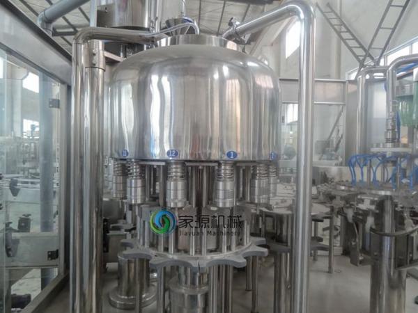 12 Pcs Heads Water Bottle Filling Machine Full Automatic CSD Filling Equipment