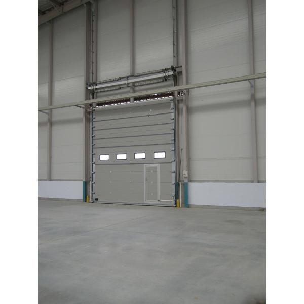 Station de pompiers Automatique Porte de levage industrielle lourde Porte de levage industrielle sectionnelle en PU avec conception étanche aux intempéries et porte sectionnelle industrielle