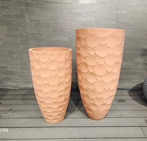 Warm Earthy Terracotta Tone Round Fiber Clay Planter With Rounded Tiles Arranged