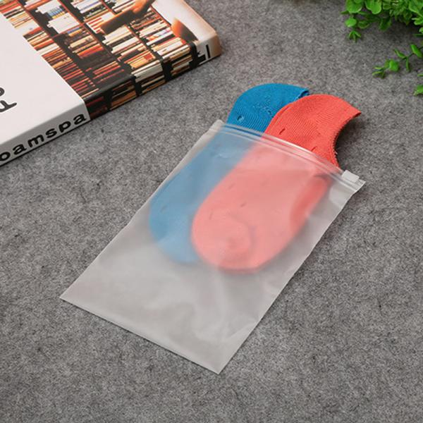 Voyage emballant les sachets en plastique faits sur commande pour le stockage de sous-vêtements de vêtements de bain de T-shirt de vêtements