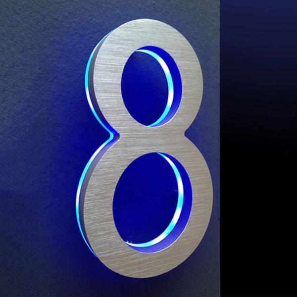 Iluminação de prata do halo dos números e das letras da porta da casa do metal da escova