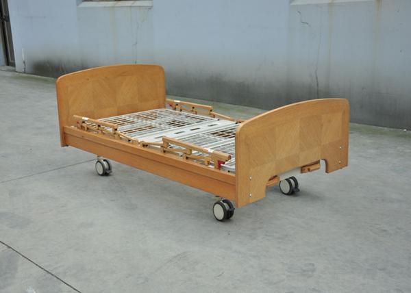 Two Manual Crank Nursing Home Beds Solid Wood Structure Aluminum Alloy Side Rail