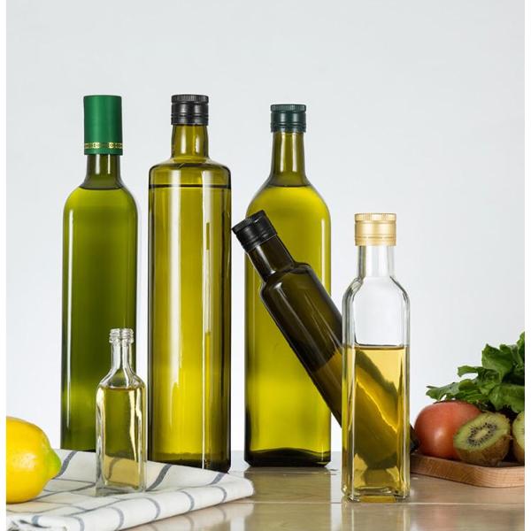 Bouteille d'huile d'olive en verre clair pour le stockage de la cuisine