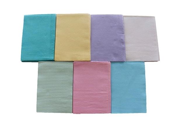 Disposable multi-colored dental paper laminated with film bib for medlical treatment