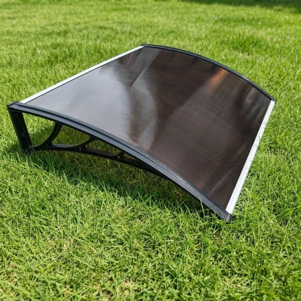 Brown Window Polycarbonate awning featuring plastic or aluminum bracket designed to provide long lasting protection and enhanced aesthetic appeal