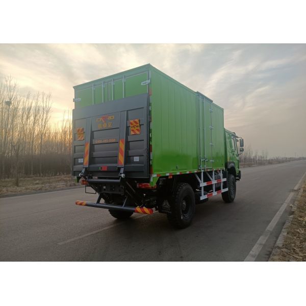 SINOTRUK Heavy Duty Truck with 4X4 LHD Drive Type, 5000*2300*2300 mm Cargo Tank, and 16T Rear Axle Capacity for Heavy Load Hauling