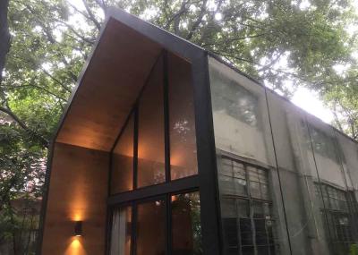 O sótão esperto da casa pré-fabricada do inchamento dirige a cabana rústica de madeira com o hotel de flutuação do chalé da isolação