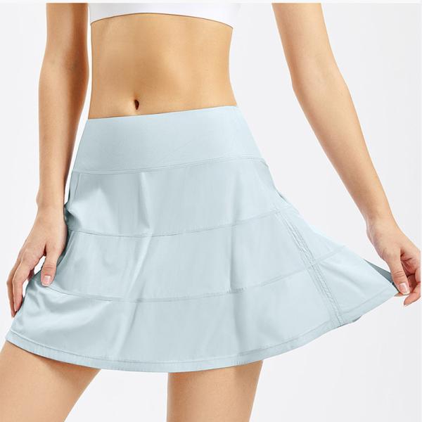 O golfe das mulheres de nylon veste esportes que do tênis Skort contorna a impressão cor-de-rosa