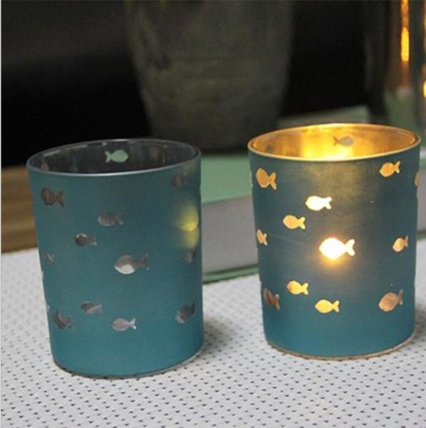 Electroplate blue glass votive candle holder with hollow sea fish decor