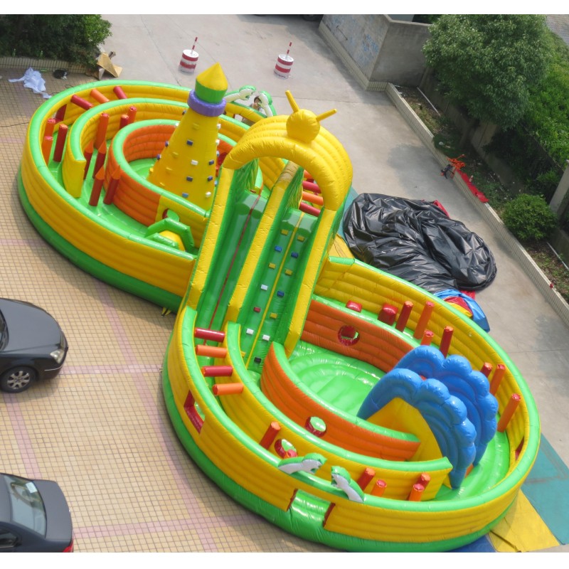 Figure Eight Inflatable Obstacle Course with Central Climbing Wall Slides and Curved Challenge Track