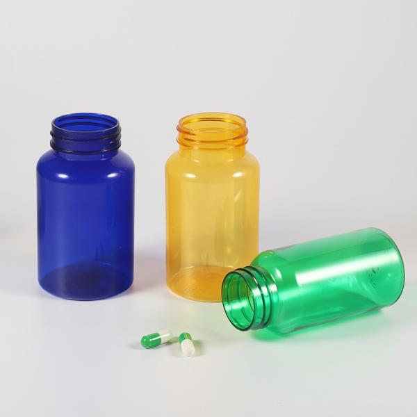 Highly Customized 4oz PET Capsule Bottle of Orange Black Plastic Nutrition Supplement with Purple Tamper Proof Packaging