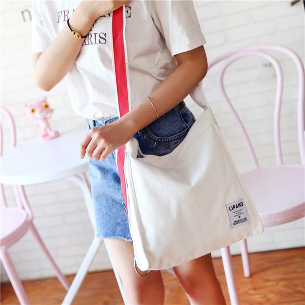 New canvas small ring shoulder Messenger bag simple portable leisure Joker bag women