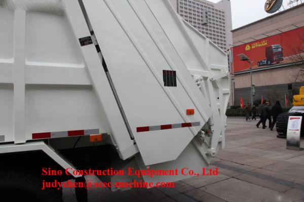 Sinotruk Howo 4x2 Rubbish Truck 12m3 Hydraulic Lifting 290hp 2m3 Filler Capacity
