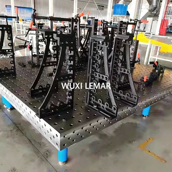 D28 series welding table with locking casters and adjustable legs