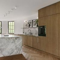 Fabricant personnalisé Moderne panneau plat Moderne conceptions Armoires de cuisine en faisceau de bois Pour le constructeur