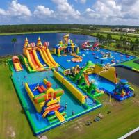 Land Inflatable Water Park With Big Slides And Floating Toys