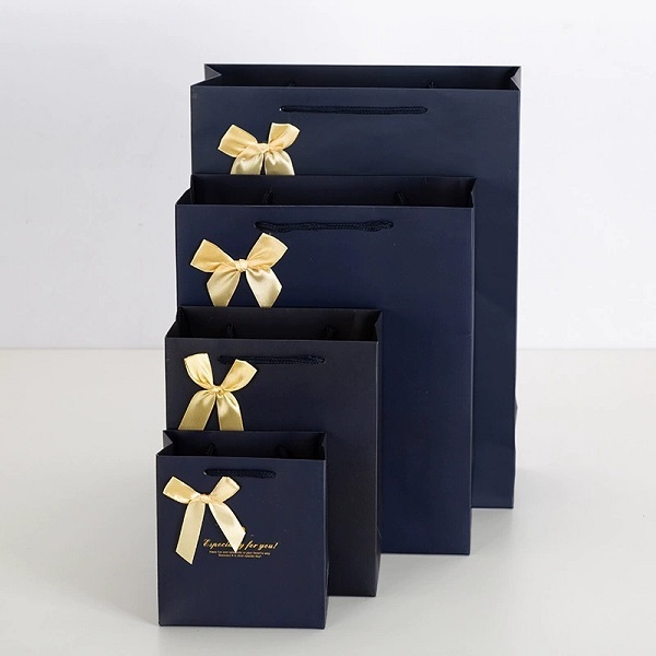 Paper Gift Shopping Bags with Satin Ribbon Bow Knot Handles for Luxury Retail