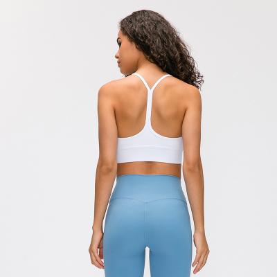 Bainha alargada pro pele do sutiã dos esportes da cor sólida da parte traseira do fluxo Y para o Gym de corrida da ioga