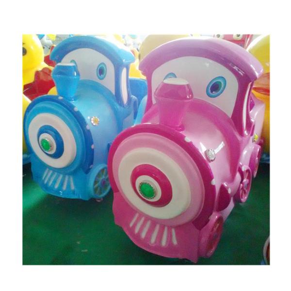 Coin operated kiddie ride with music and swing for little kids