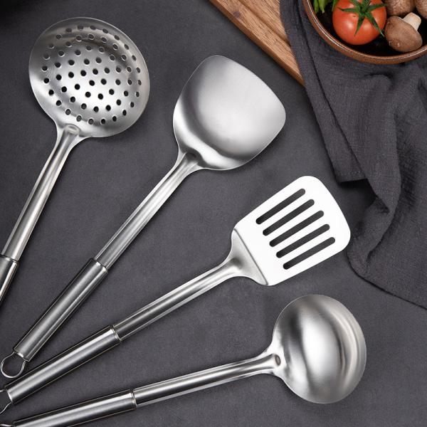 Stainless steel kitchen tool with stainless steel handle