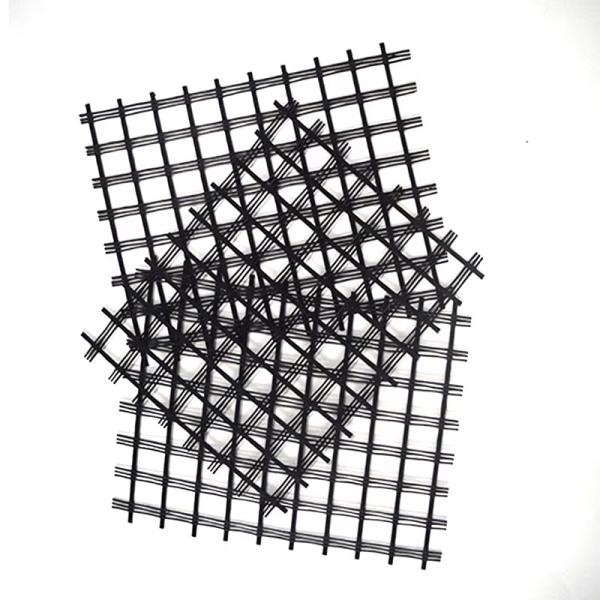 Asphalt Reinforcement 100KN Fiberglass Geogrid Mesh 25.4x25.4mm For Bitumen Road Surfaces