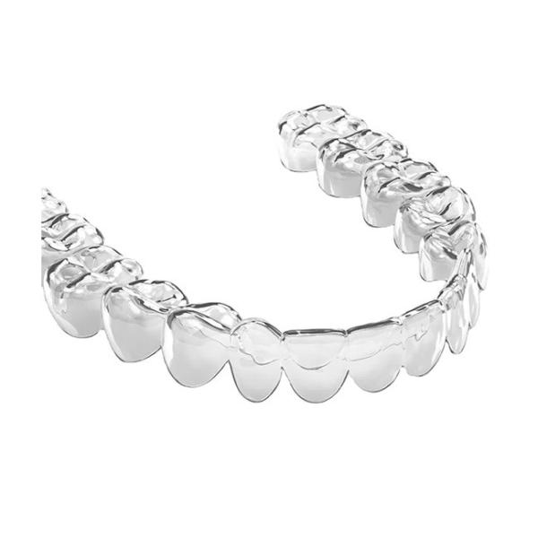 Красивый зубоврачебный мост кроны носит естественное восстановление жуя силу