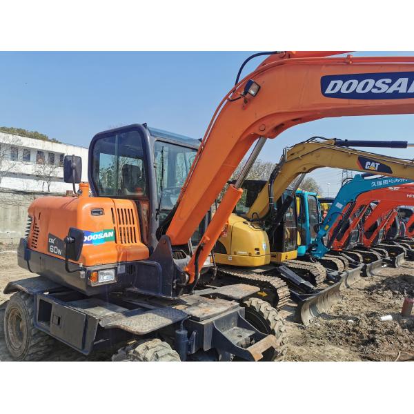 Excavadora de ruedas Doosan DX60W con motor YANMAR y capacidad de cubo de 0,21m3