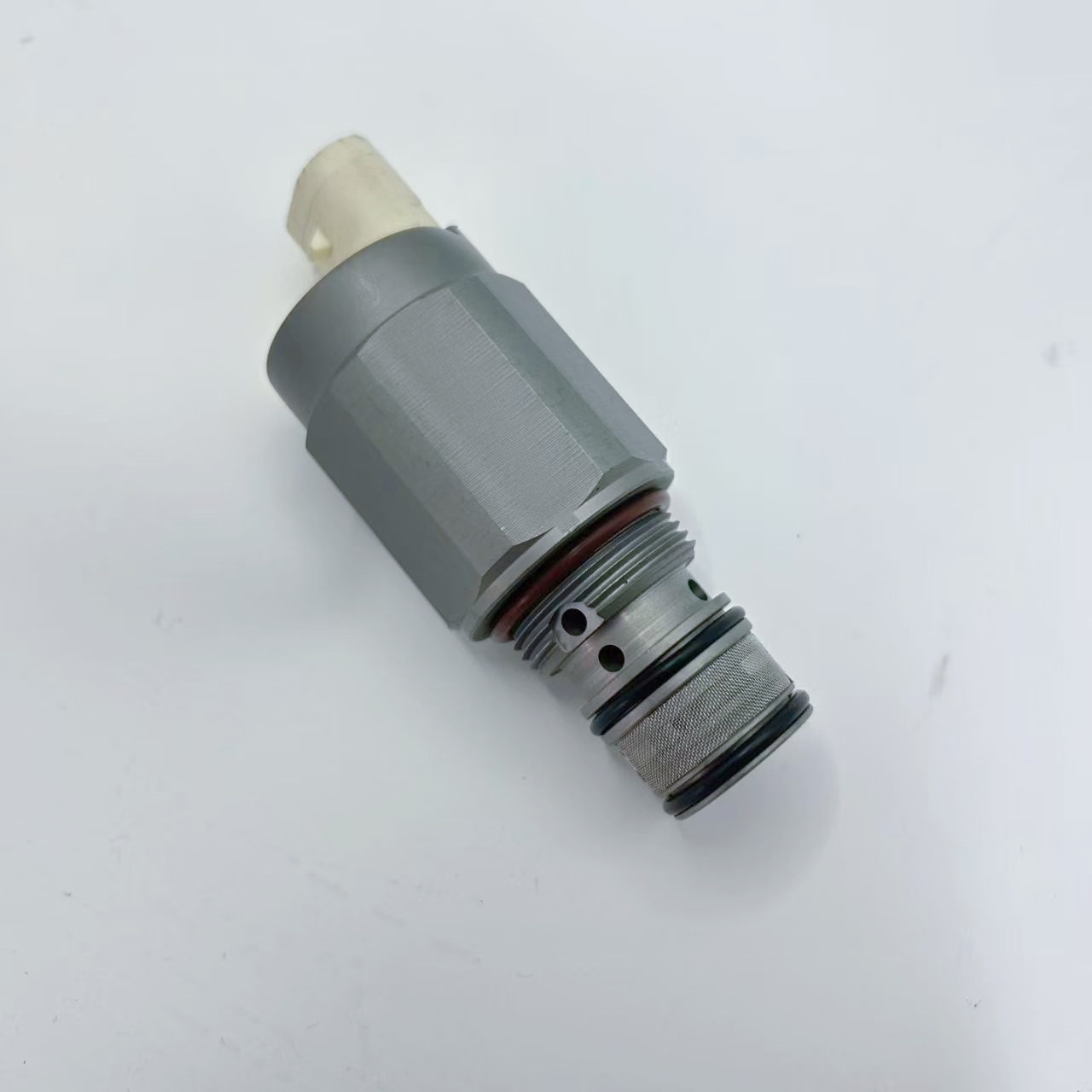 solenoid valve RE183407 used for JD5083E controlling hydraulic fluid flow and managing forward and reverse gear shifting