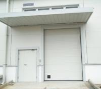 Porte de garage sectionnelle 50 mm-80 mm d'épaisseur isolée Porte de garage sectionnelle pour centre commercial et commercial