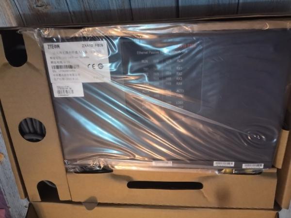 ZTE F809 ZTE ZXA10 F809 industrial ONU of the fixed box type and with 4 FE ports and 4 RS232/RS485 interfaces