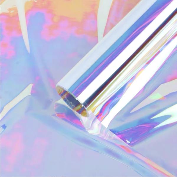 Brillante y colorido opp bolsa impermeable papel de flores, papel láser, película de siete colores de Internet famoso, materiales al por mayor para los materiales de arte de las flores en la floristería