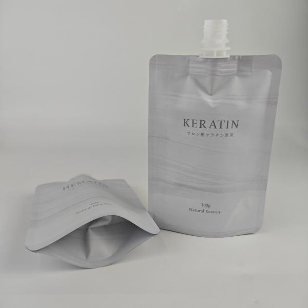 Poche cosmétique adaptée aux besoins du client de bec de sac de conditionnement en plastique de soins de la peau de soudure à chaud de la vente en gros 100g avec le coin rond