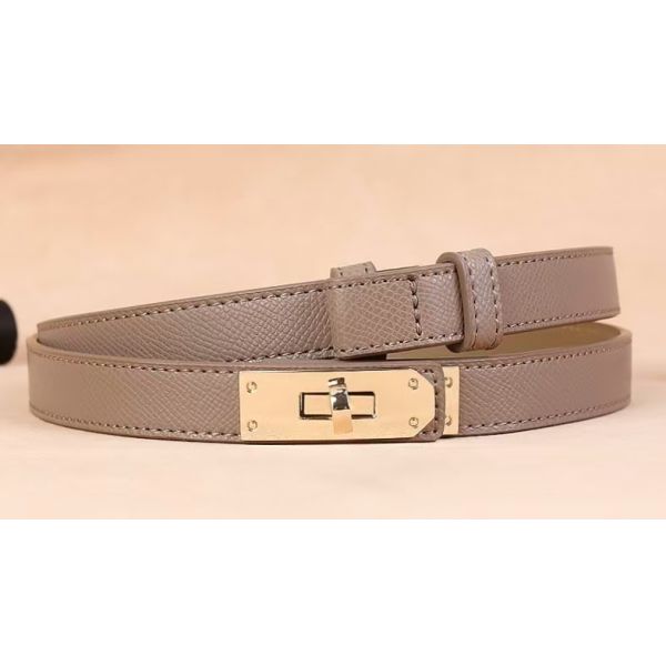Adjustable belt, alloy buckle, leather texture, fashion accessory, minimalist design, skirt accessory, dress accessory