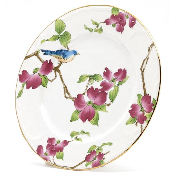 Plato decorativo de cerámica blanca con bordes dorados para la fiesta de bodas