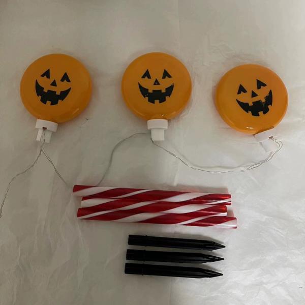 Christmas decorative lights, LED battery-powered lights, round smiling faces, outdoor garden scene setup, decoration, stand