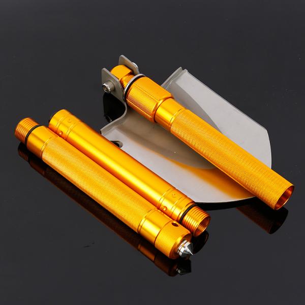 На открытом воздухе садовничая ручные инструменты, располагаясь лагерем складывая лопату многофункциональную