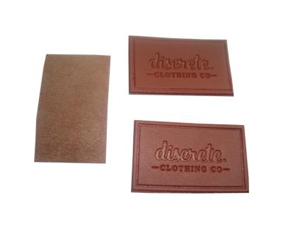 As etiquetas de couro feitas sob encomenda genuínas anunciaram o revestimento protetor cortado Longlasting de Velcro da beira