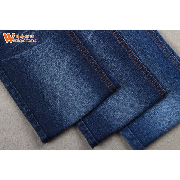 China Stocklot Cotton Poly Stretch Denim Fabric for Jeans Garments